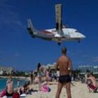 _conheca_maho_beach_a_praia_onde_avioes_voam_baixo