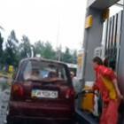 Mulheres no posto de gasolina