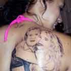 fa_faz_tatuagem_gigante_do_casal_joelma_e_chimbinha