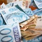 por_que_dilma_arredondou_o_salario_minimo_para_menos