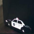 A menor perseguição policial utilizando projetores de vídeo de bolso