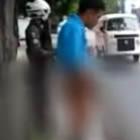 Motorista urina na frente do policial