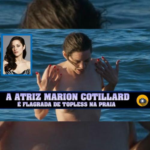A atriz Marion Cotillard é flagrada de topless na praia