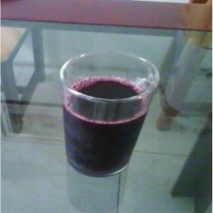 Um copo de suco de uva