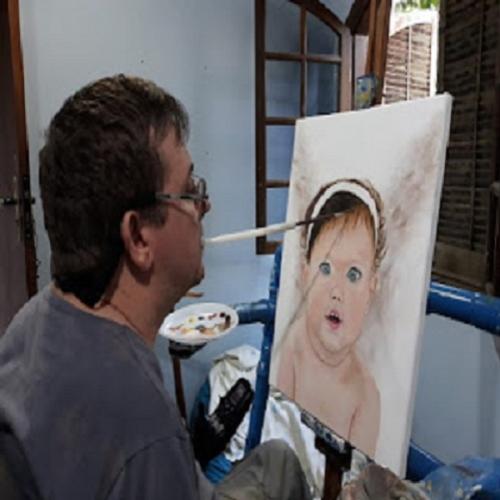 Arte e coração, pintor com a boca tetraplégico.